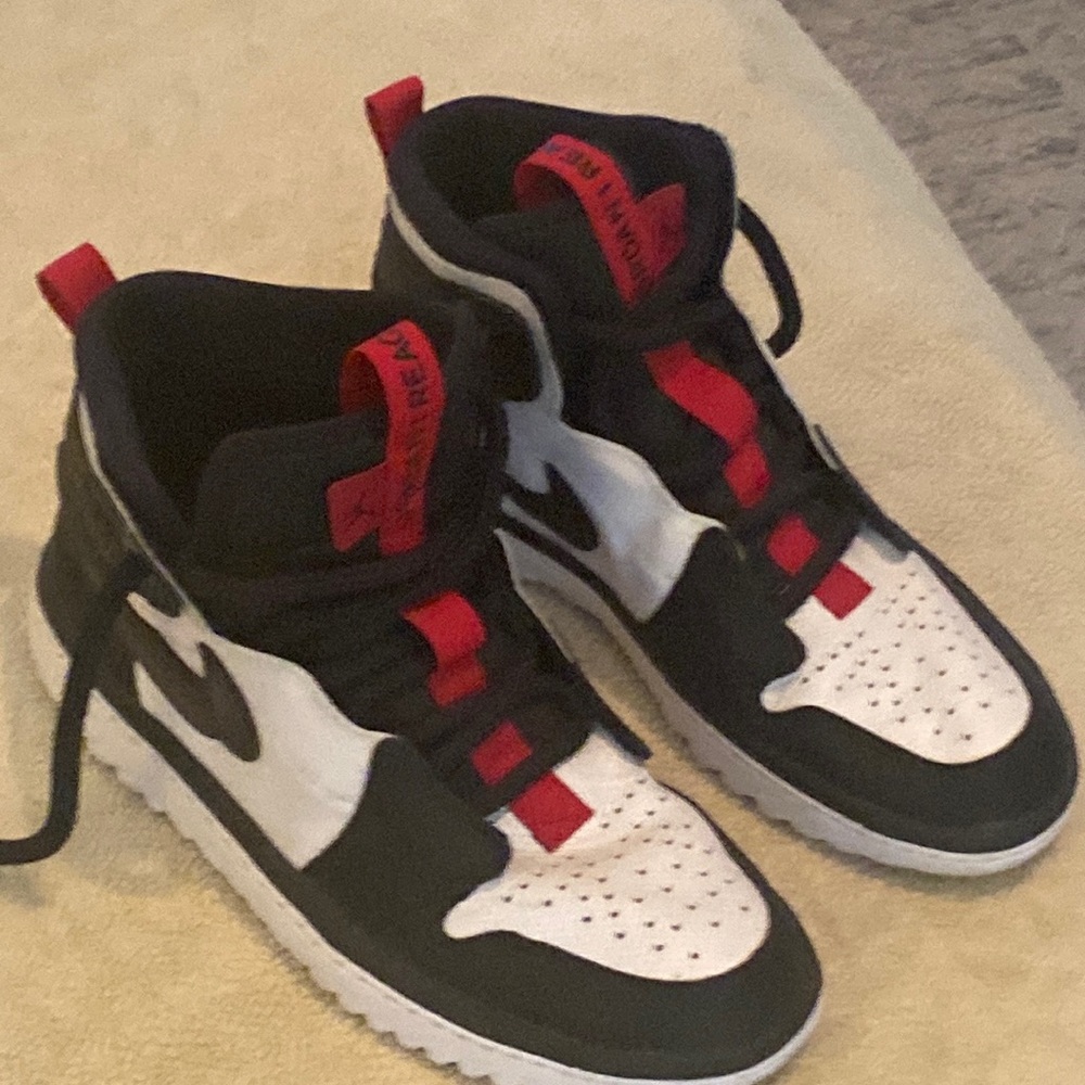 Jordan 1 Reacts, size 12. Great shape, kept clean and rarely worn.